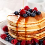 Pancake sebagai salah satu menu sarapan memang praktis, mudah dibuat, dan tentunya lezat. Kini terdapat berbagai varian pancake dan juga aneka topping lezat pelengkap pancake. Semuanya akan meningkatkan seleramu saat sarapan. 