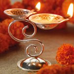 In many Indian households, diyas are an essential part of ceremonies, auspicious functions and prayers. Silver and brass diyas are popularly found in homes. So if you are looking for diyas to worship, then you can explore our curated list of best silver lamps you can buy to adorn your prayer room or mandir. Scroll on for the full list. 