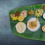 Celebrated every year around the months of August-September, Onam is the harvesting festival of the Indian state Kerala. Onam Sadhya is a traditional meal covering tens of dishes which is usually served on banana leaves. We bring a complete guide for preparing your own Onam Sadhya meal. 