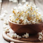 Popcorn adalah makanan ringan yang biasanya kamu jumpai di bioskop. Kini kamu bisa menikmatinya saat bersantai di rumah lho. Yuk, simak rekomendasi popcorn kemasan terenak versi BP-Guide berikut ini.