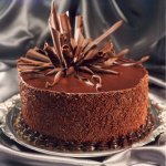 The article talks of ways of decorating a cake with chocolate. We have provided you with ways of making different kinds of chocolate decorations for your cake, that you can use the next time you bake a cake for a loved one. 