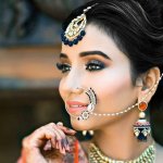 Your bridal look is not just about your saree/lehenga and jewelry. Your hairstyle also plays an important part in completing your bridal look. And a beautiful hairstyle comes with beautiful hair accessories. From mang tikka to tiara, there are many that give you the princess feel. We put together 6 such bridal hair accessories complete with 3 stunning hairstyles for your viewing pleasure. 