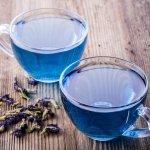 Tea made with herbal ingredients is said to contain a bunch of healthy ingredients that boost the body's immunity and prevent various severe conditions related to various organs. Blue tea is prepared from one such ingredient - the butterfly pea plant, which provides numerous benefits. This post discusses the benefits of blue tea, along with recipes for the same. Read on to know more.