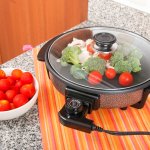 Bagi kamu yang butuh panci praktis untuk memasak, bisa banget mengandalkan panci listrik. Jenis panci ini mudah digunakan karena tinggal dicolokkan saja pada listrik lalu siap dipakai untuk menumis, mengukus, dan tentu saja memasak aneka hidangan berkuah. Yuk, intip tips memilih panci listrik dari kami! Jangan lupa cek juga rekomendasi produk terbaiknya!