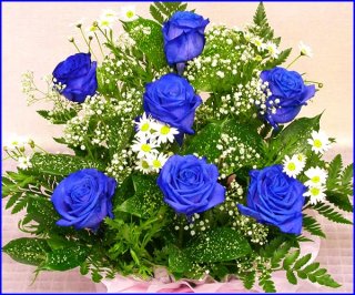 青色の花のアレンジメントは、サムシングブルーをお探しの方に