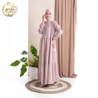 15. Zahira Dress Beige Baju Muslim, Minimalis dan Adem 