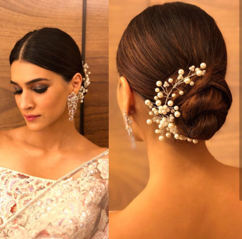 10 Saree Hairstyles That Will Turn Your Look Into A High Fashion Statement This hairstyle features a puff pulled back into a half updo with the rest of. 10 saree hairstyles that will turn your