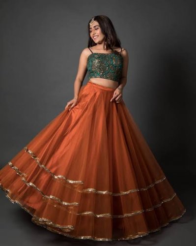 Do You Want to Opt for  Something Traditional But Worry of Over-doing It? Choose Your Next Party Outfit from Our List of Latest Trending Party-wear Lehengas!